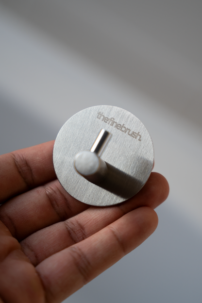 The Fine Hook brushed stainless steel wall hook — waterproof, shower-safe, no drilling required