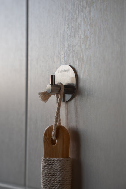 Rust-proof stainless steel bathroom wall hook in use — drill-free 3M adhesive mount built for humid showers